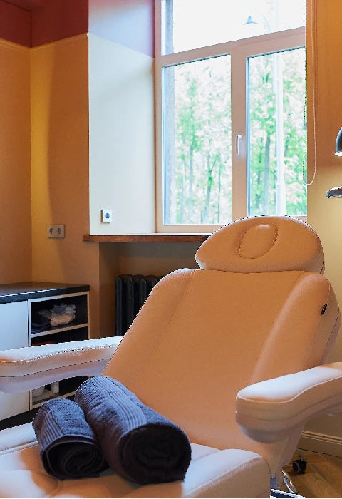 Professional aesthetician in a modern clinic setting for Cosmetic Quarter.